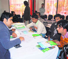 Counsellors at an education fair of New Zealand Universities in Dehradun on Monday. 