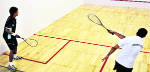 A match in progress at the National Inter-university Squash Championship in Haridwar on Monday