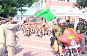 Director-General of Police Subhash Joshi flags off motorcycle-borne fire fighters in Dehradun
