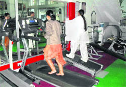Girls workout at a gym in Fatehabad.