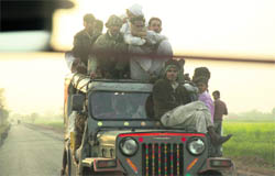 Not caring two hoots for the traffic rules, an overloaded jeep plies near Pinangwa village in Mewat