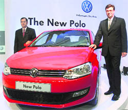 Lutz Kothe (R), chief general manager, marketing and PR, Volkswagen, and Neeraj Garg, member of board and director of Volkswagen passenger cars, during the launch of Polo in Mumbai on Tuesday.