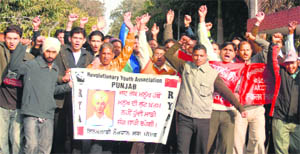 Punjab Engineering College students and mess workers take out a protest march on the college campus on Tuesday.