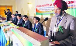 Dr Himmat Singh, Director of Advance Institute of Science and Technology, speaks at a seminar in Dehradun