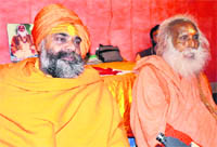 Akhada Parishad National General Secretary Hari Giri Maharaj addressses mediapersons in Haridwar