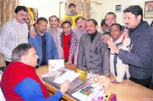 Congress councillors gherao the Chief Executive Officer at the Dehradun Municipal Corporation office on Tuesday