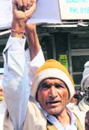 A farmers at a protest rally in Karnal.
