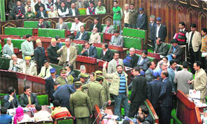 The watch and ward staff prevent PDP legislators from storming into the well of the Assembly in Jammu on Tuesday.