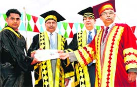 A student gets a degree during the  convocation at LD DAV College, Jagraon, on Tuesday