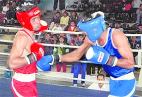 Boxers in action during the 17th AK Misra Senior Mens Boxing Championship being organised by the Chandigarh Amateur Boxing Association at the Skating Rink, Sector 10. 