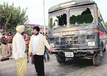 The driver of the damaged police bus narrates the incident to DSP (South)@@	Jaswant Singh Khaira at Piccadilly Chowk in Chandigarh on Wednesday. 