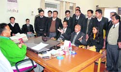 Members of the district bar association arguing with the divisional commissioner, Kangra, at Dharamsala on Wednesday. 