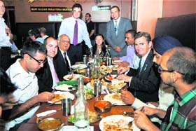 Premier John Brumby (3rd from right) dining with representatives of the Indian student community at popular Indian caf Desi Dhaba to promote the Vindaloo against Violence campaign in Melbourne
