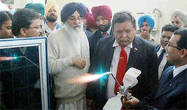 CM Parkash Singh Badal along with chairman and MD of the Larsen & Toubro group A.M. Naik watching the demonstration of a welding equipment at the Construction Skills Training Institute in Abul Khurana village, Muktsar