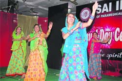 Students perform at the annual function of the Sai Institute of Paramedical and Allied Sciences in Dehradun on Thursday.