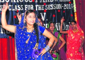 Students of DAV Girls Senior Secondary School dance during the farewell party in Karnal