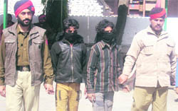 The two youths arrested for snatching in police custody