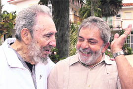 In this photo released by Brazil's Presidency, Brazil President Luiz Inacio Lula Da Silva (right) smiles with former Cuban leader Fidel Castro in Havana on Wednesday.