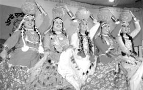 Girls perform a Punjabi folk dance at the folk festival in Patiala on Friday.