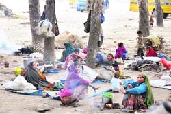 Nomads living in the open at the Parade Ground in Dehradun. 
