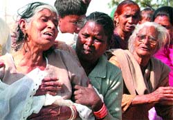 A wailing relative at the accident site