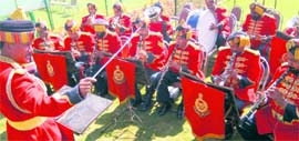 A pipe band performs. 