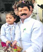 A file photo of JD(U) MLA Abhay Singh with his daughter.
