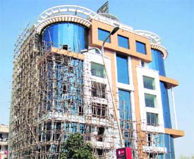 An under-construction commercial project on Sirsi Road