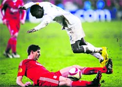 Steven Gerrard (down) vies for the ball against Antonio Semedo on Thursday