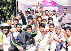 Himalayan Cricket Academy with their trophy after winning the Late Chandan Singh Thapali u-15 Talent Search Cup in Dehradun on Saturday.