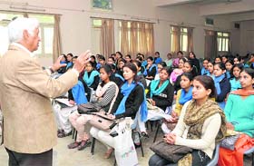 Avi Nanda, a senior advocate, addresses students of MKP Girls College on legal awareness in Dehradun
