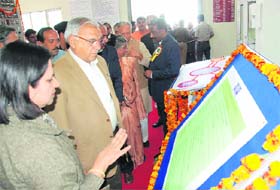 Haryana Vidyut Nigam MD Jyoti Arora briefs Chief Minister Bhupinder Singh Hooda on the salient features of the states first gas-insulated substation which was inaugurated in Gurgaon recently