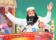 Dera Sacha Sauda chief Gurmeet Ram Rahim Singh answers queries by mediapersons during a congregation on Sunday. 