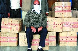 Accused Jugal Kishor Chopra and the seized medicines