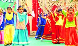 Students perform a folk dance on the annual day of Blossom Convent School in Ludhiana