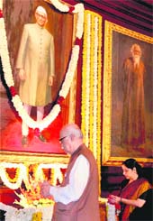 BJP leader LK Advani pays floral tribute before a portrait of former PM Morarji Desai on his birth anniversary in Parliament House in New Delhi on Sunday.
