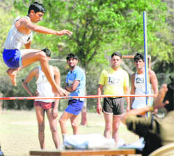 CISF candidates compete in a physical test in Chandigarh.