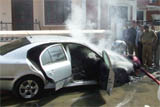 A car which caught fire due to some technical snag in Gurgaon 