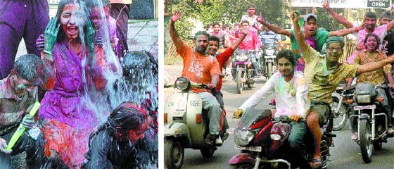 Children play with coloured water while robust youths roam about city streets on their bikes on the occasion of Holi in Jalandhar