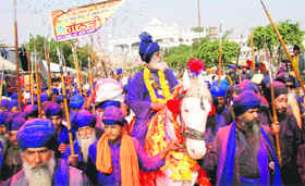 Nihangs take part in the Holla Mohalla procession in Anandpur Sahib on Monday.