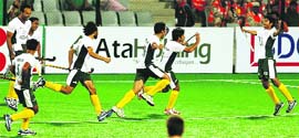 Pakistan players celebrate on Tuesday.