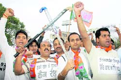 Members of the BJP protest against the ban on Indian hockey player Shivender Singh near Hockey Stadium in Sector 42, Chandigarh, on Wednesday. 