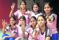 Winners of the Panjab University Inter-College Yoga (Women) Championship at the Government College of Yoga Education and Health, Sector 23, on Wednesday. 