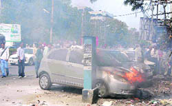 A car in flames at Mall Road in Ludhiana