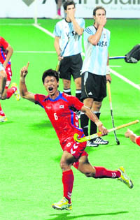 South Koreas Lee Nam Young celebrates after scoring against Argentina on Wednesday.