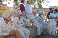 A group of elderly persons, including Dera Sacha Sauda followers and Sikhs, sharing a common platform at Gill Kalan village in Bathinda on Thursday. 