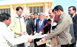 Justice Rakesh Garg (centre) with officers during an inspection of the district jail in Jhajjar