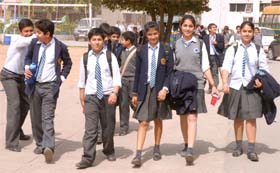Happy faces say it all: Students come out of the examination hall in Jalandhar