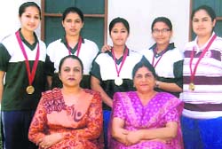 Shuttlers with college authorities in Ludhiana on Thursday. 