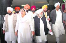 Congress MLAs led by Rajinder Kaur Bhattal walk out of the Punjab Vidhan Sabha in Chandigarh on Thursday.